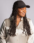 black woman wearing kimmie cap wig with cap